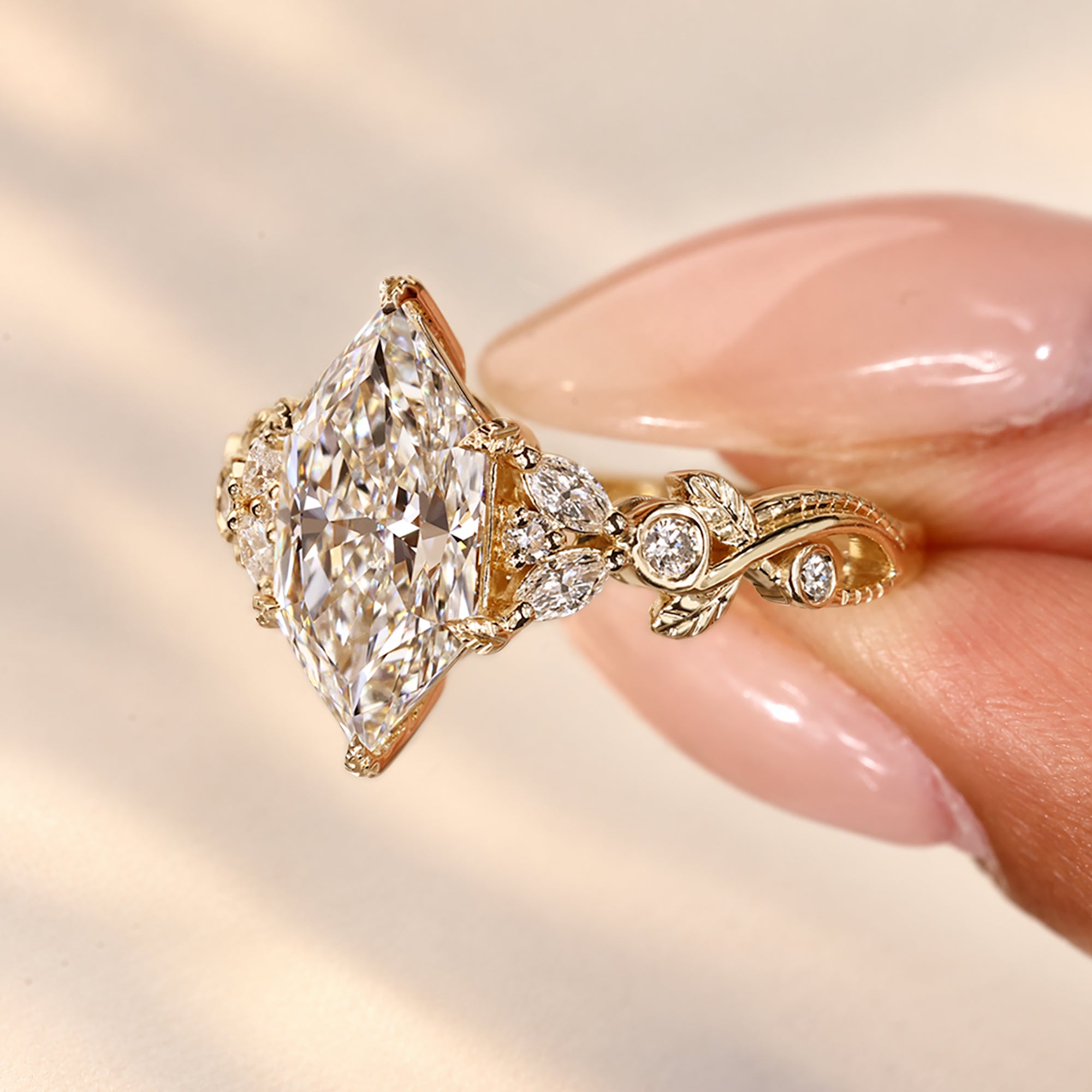 Handmade nature inspired marquise diamond ring.
