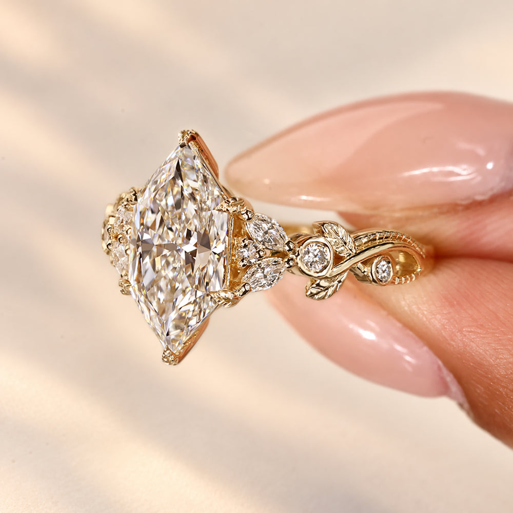 Handmade nature inspired marquise diamond ring.
