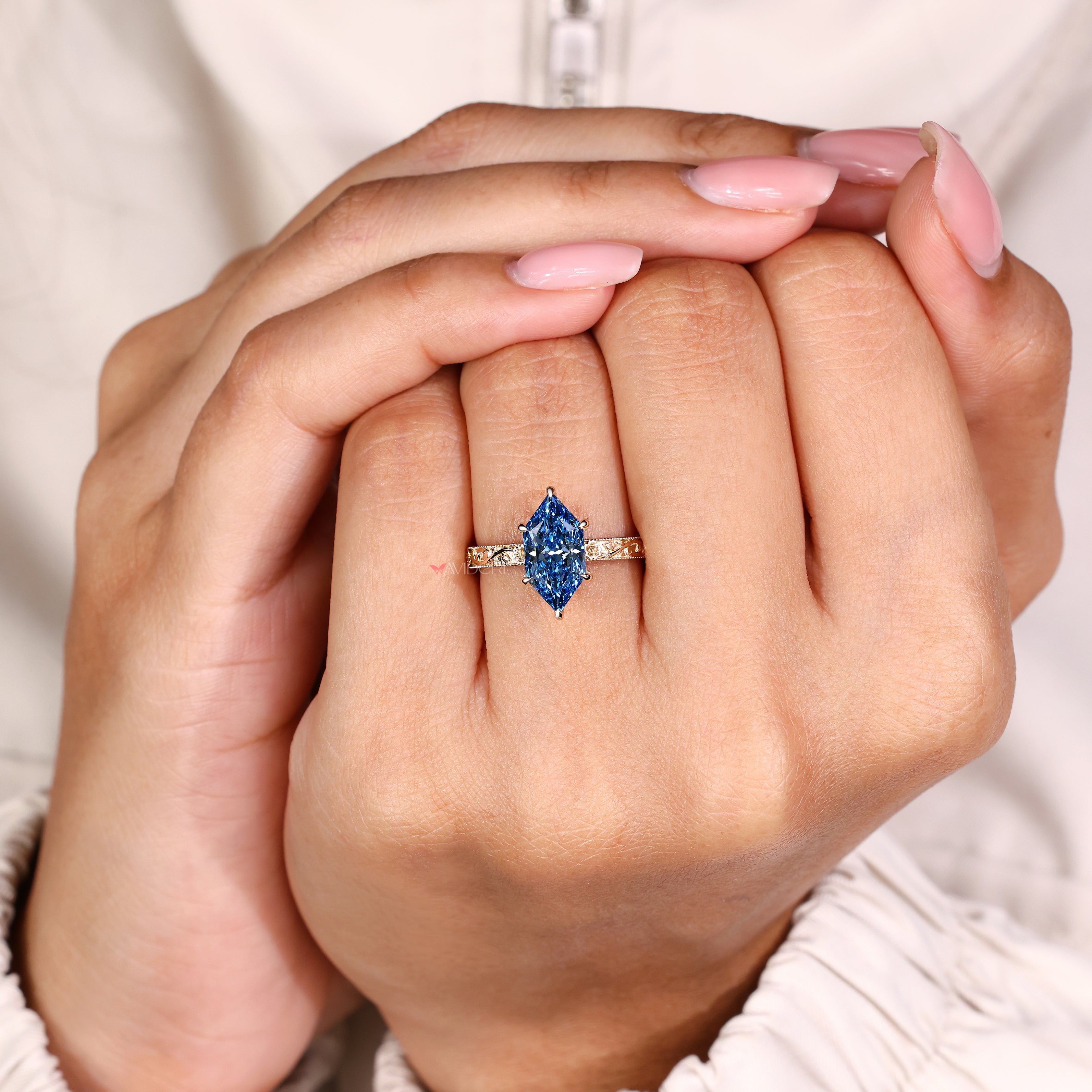 Solitaire Dutch marquise diamond ring with six claw setting

