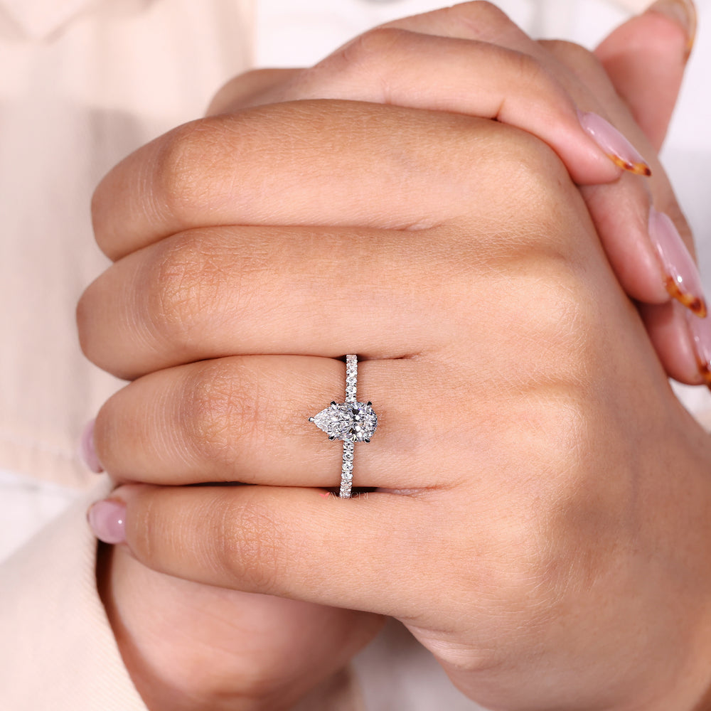 White Gold Ring with a pear-shaped diamond for a sleek engagement look.