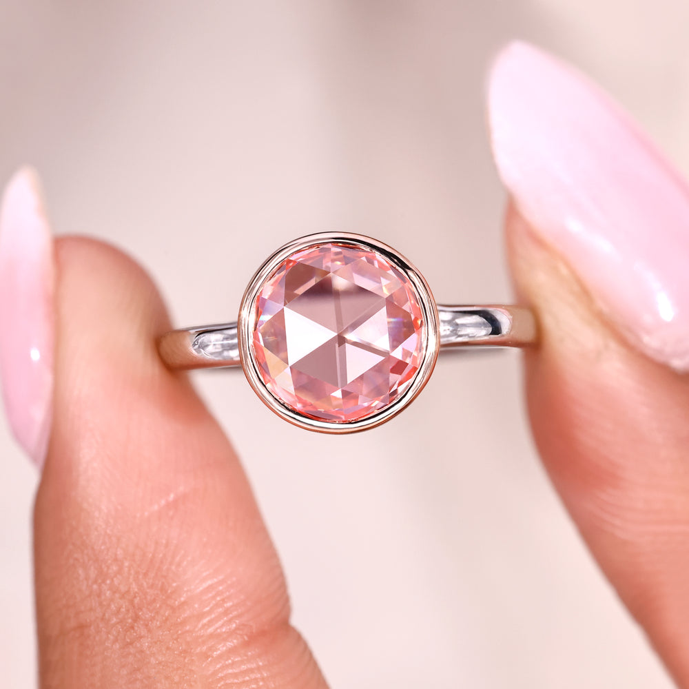 Solitaire diamond engagement ring with clean and elegant design.