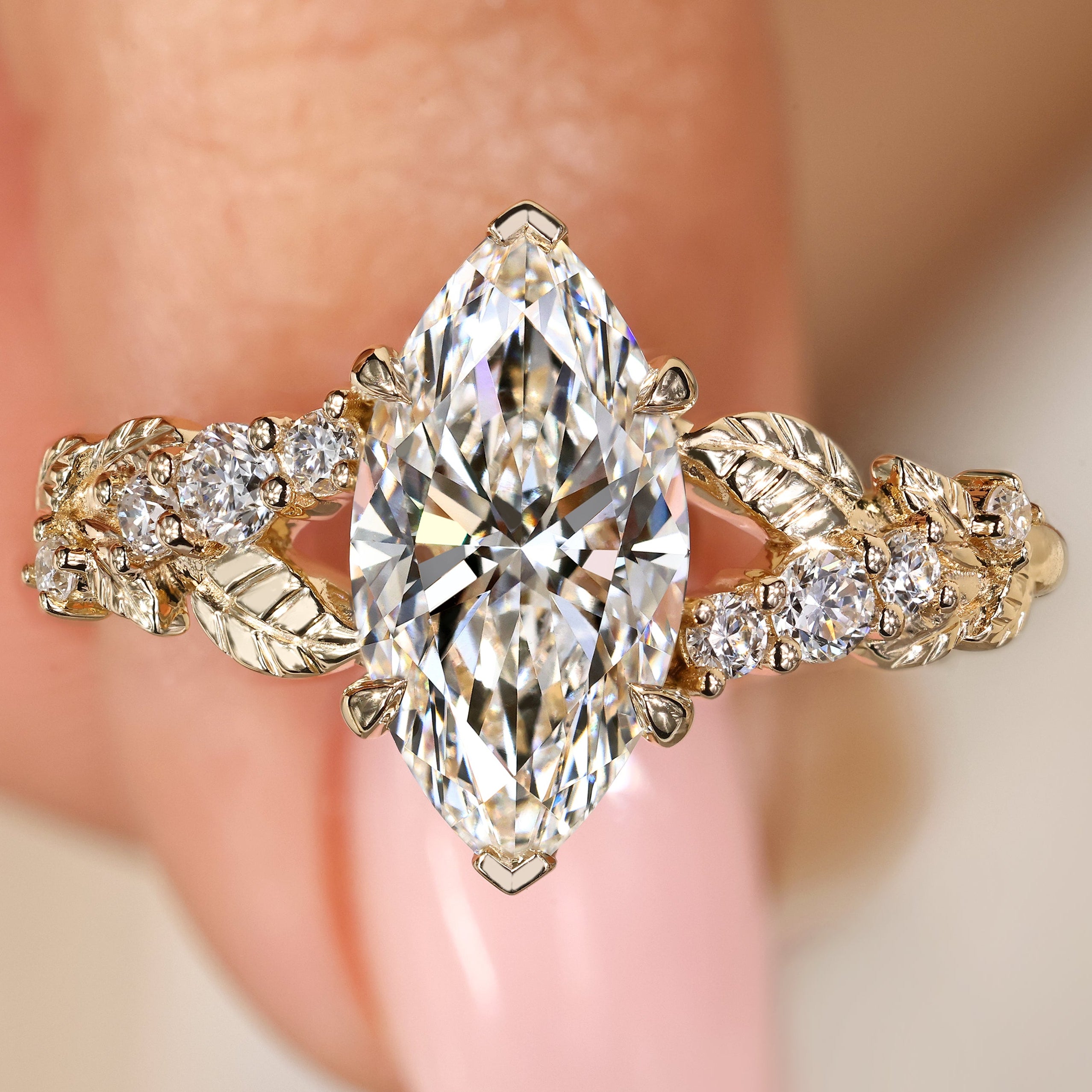 Nature inspired marquise diamond ring with sides.

