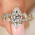 Nature inspired marquise diamond ring with sides.
