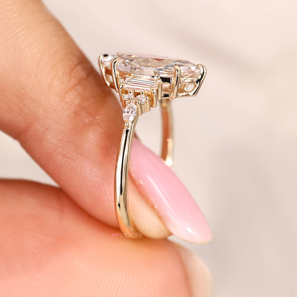 Nine stone marquise diamond ring with muse setting.
