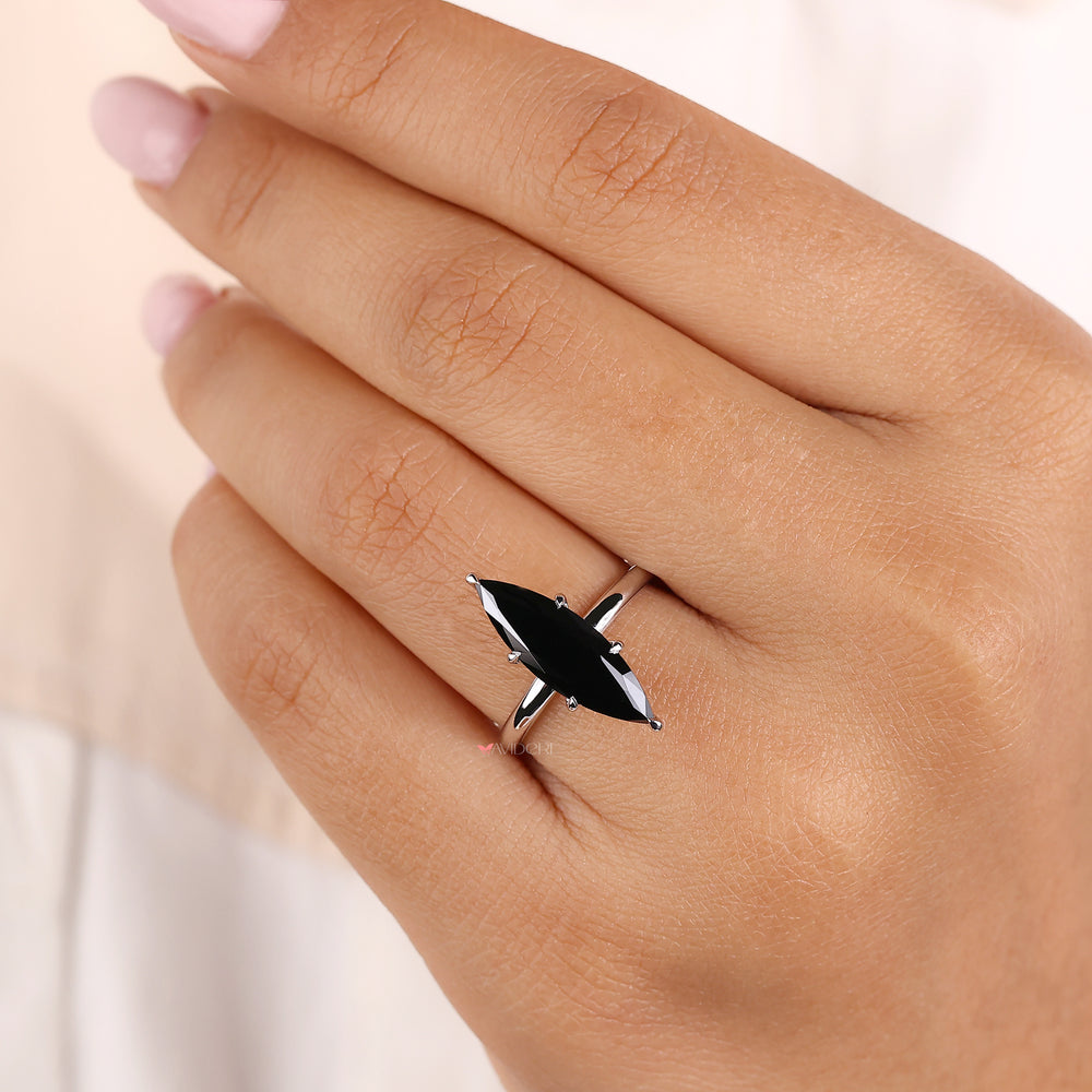Handmade ring designed with a marquise cut gem.