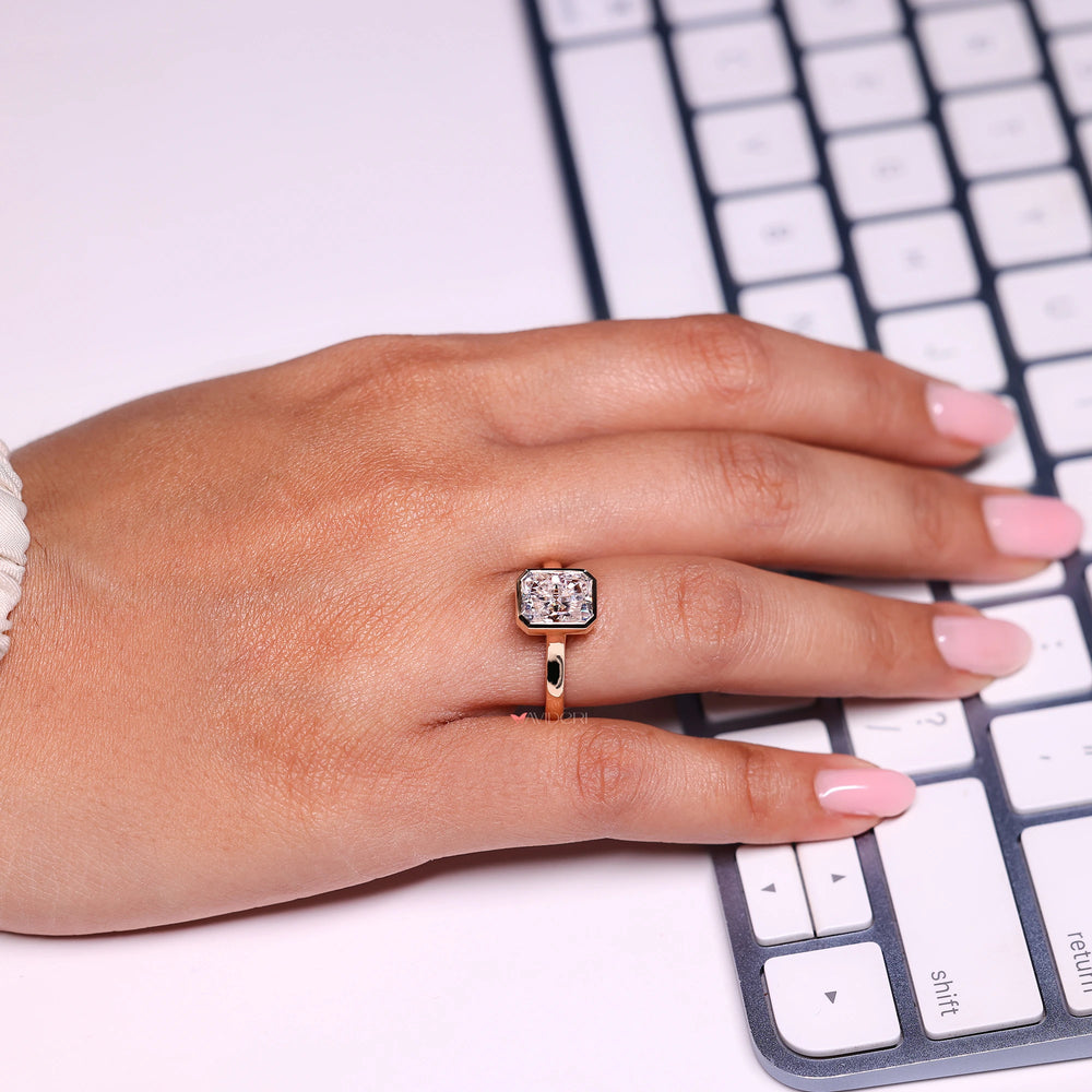 Bezel ring setting holds diamond safely with metal around it.