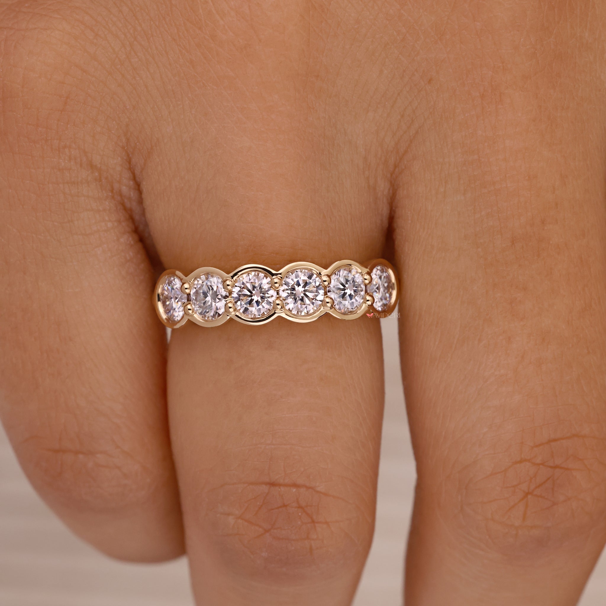 Lab grown diamond band with timeless round cuts.
