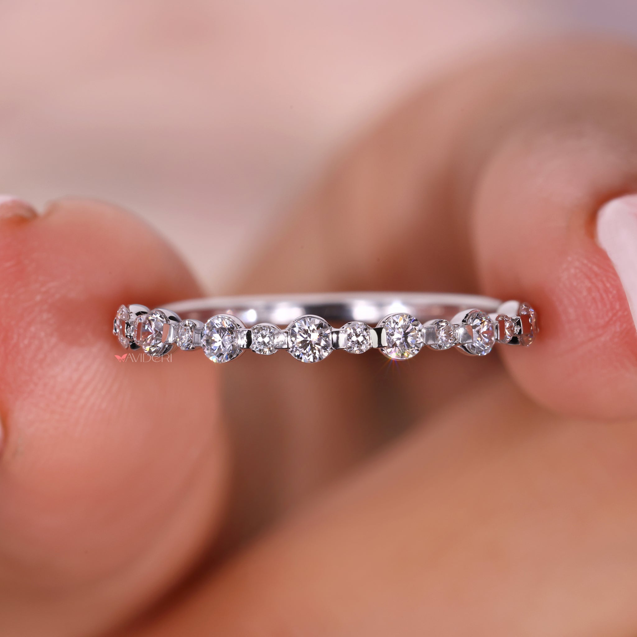 A half eternity wedding band adorned with sparkling diamonds for a subtle yet luxurious look.
