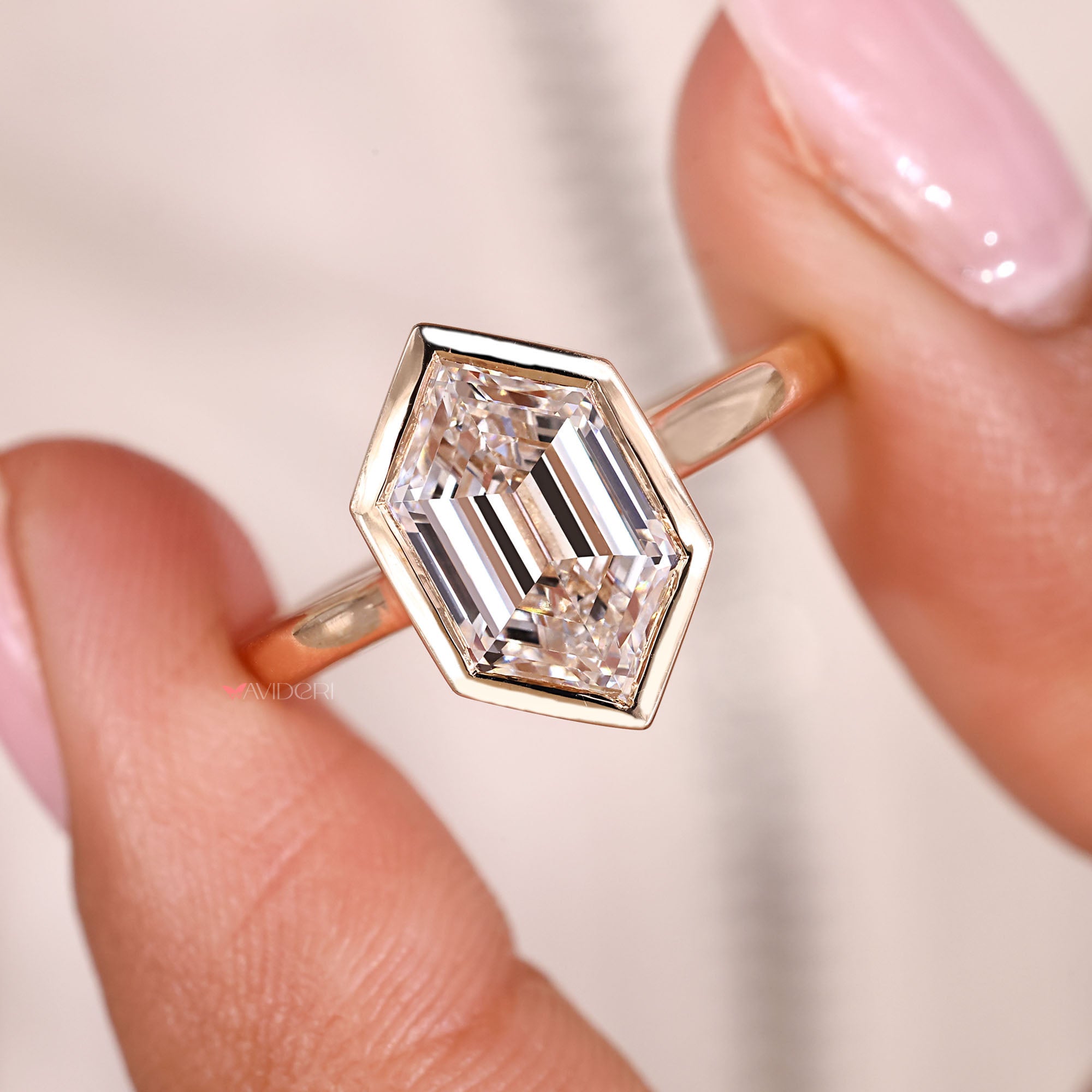 Custom diamond ring featuring a unique hexagon cut.