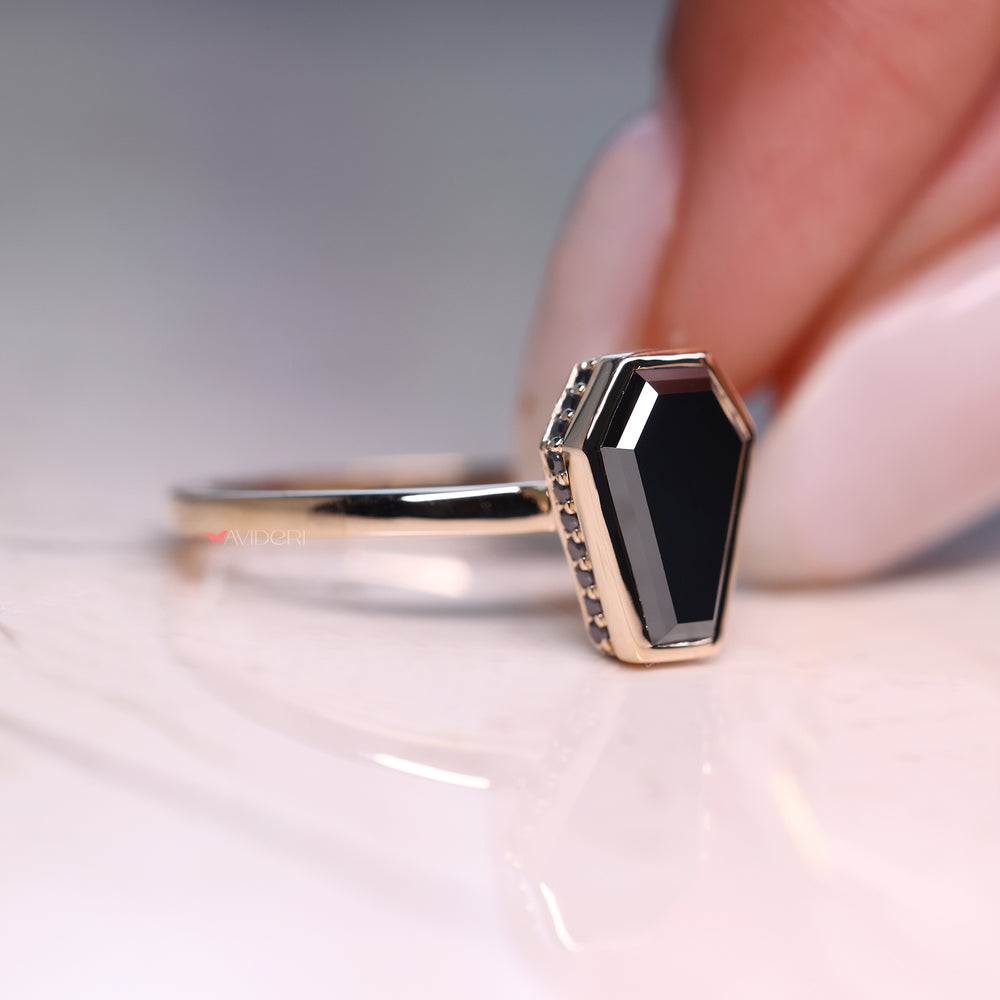 Secure and stylish, the bezel set engagement ring offers clean lines.
