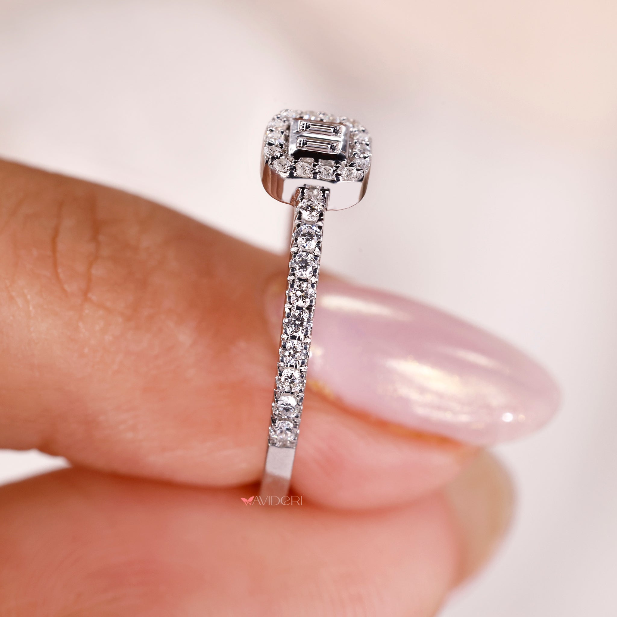 round diamond engagement ring with halo setting and lab grown stones.