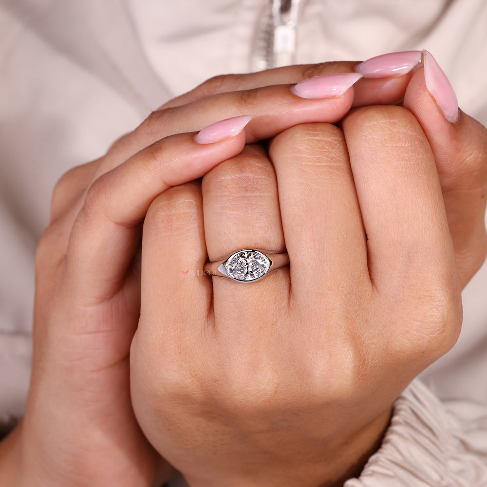 IGI certified lab grown oval diamond bezel ring.
