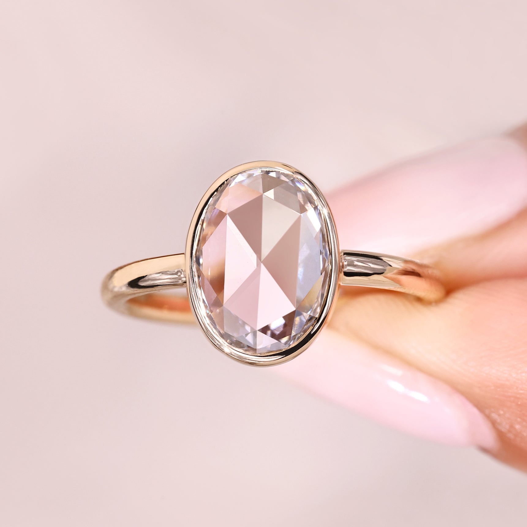Elegant oval rose cut solitaire diamond ring.
