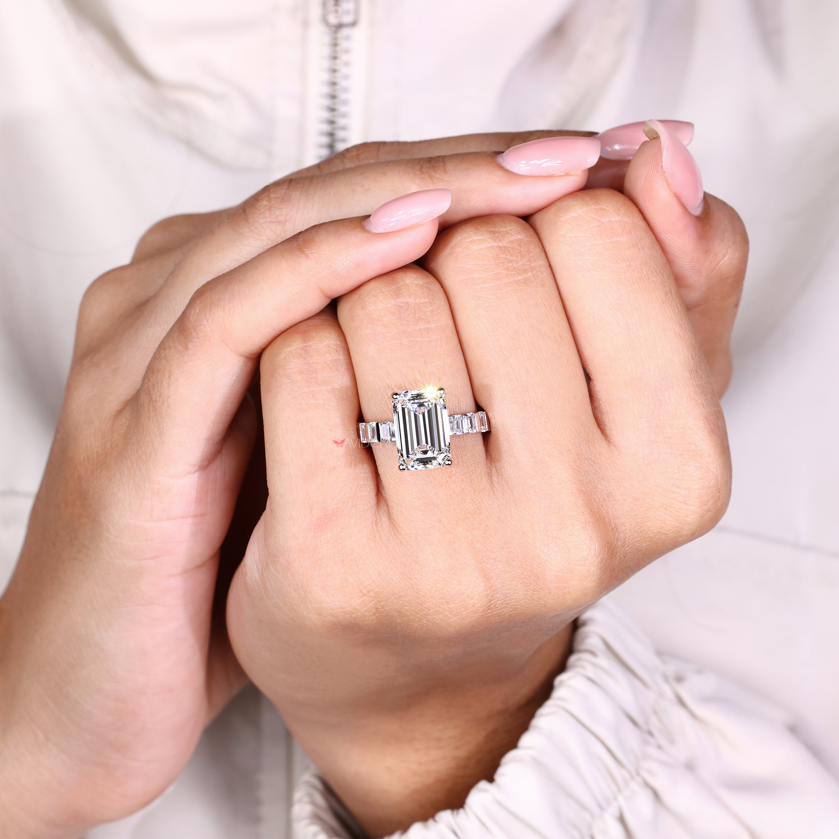 Handmade emerald cut diamond ring with side emerald diamonds
