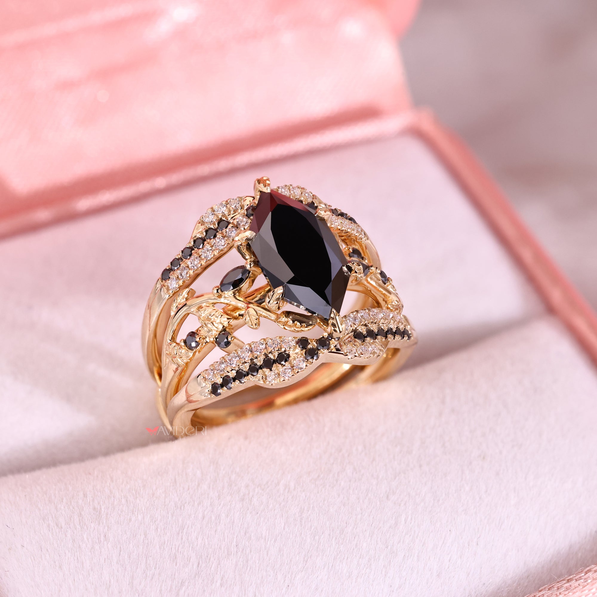 Round cut moissanite band matched with a Dutch marquise engagement ring.