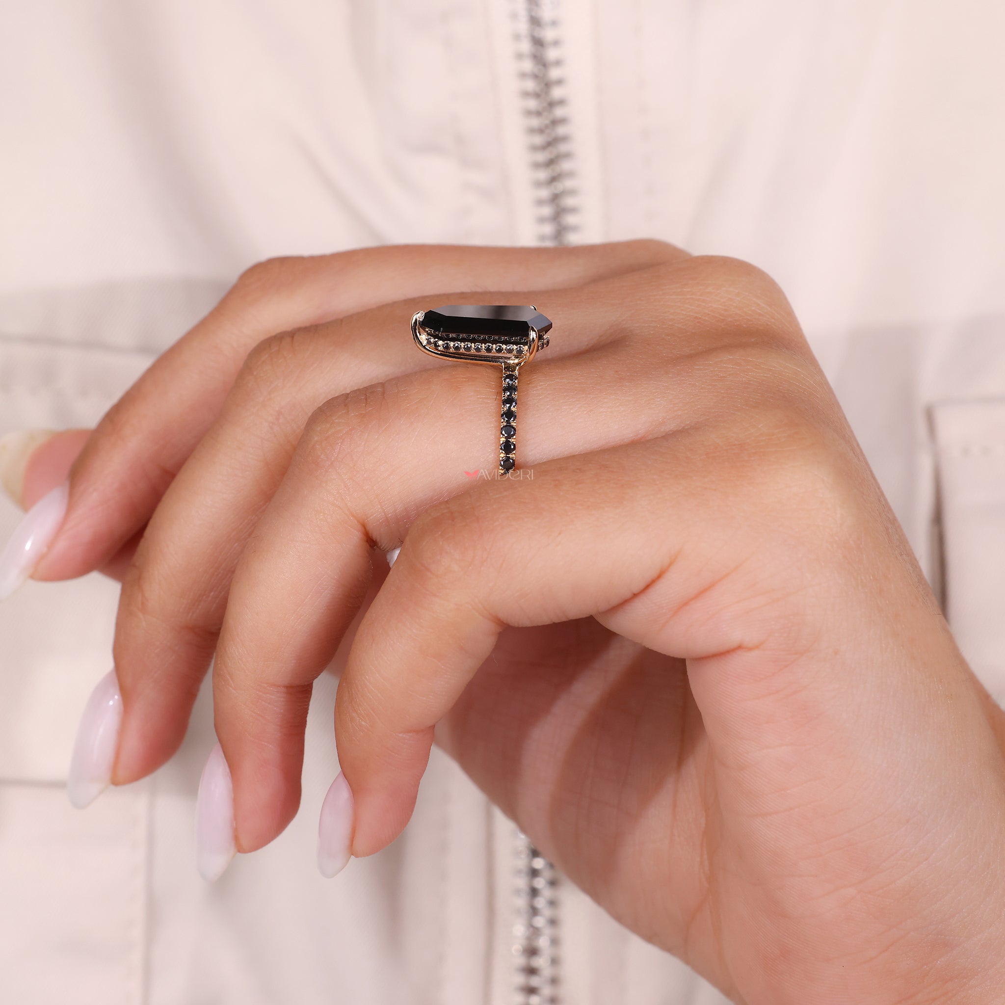 Round side stone ring with a unique center and delicate accents.
