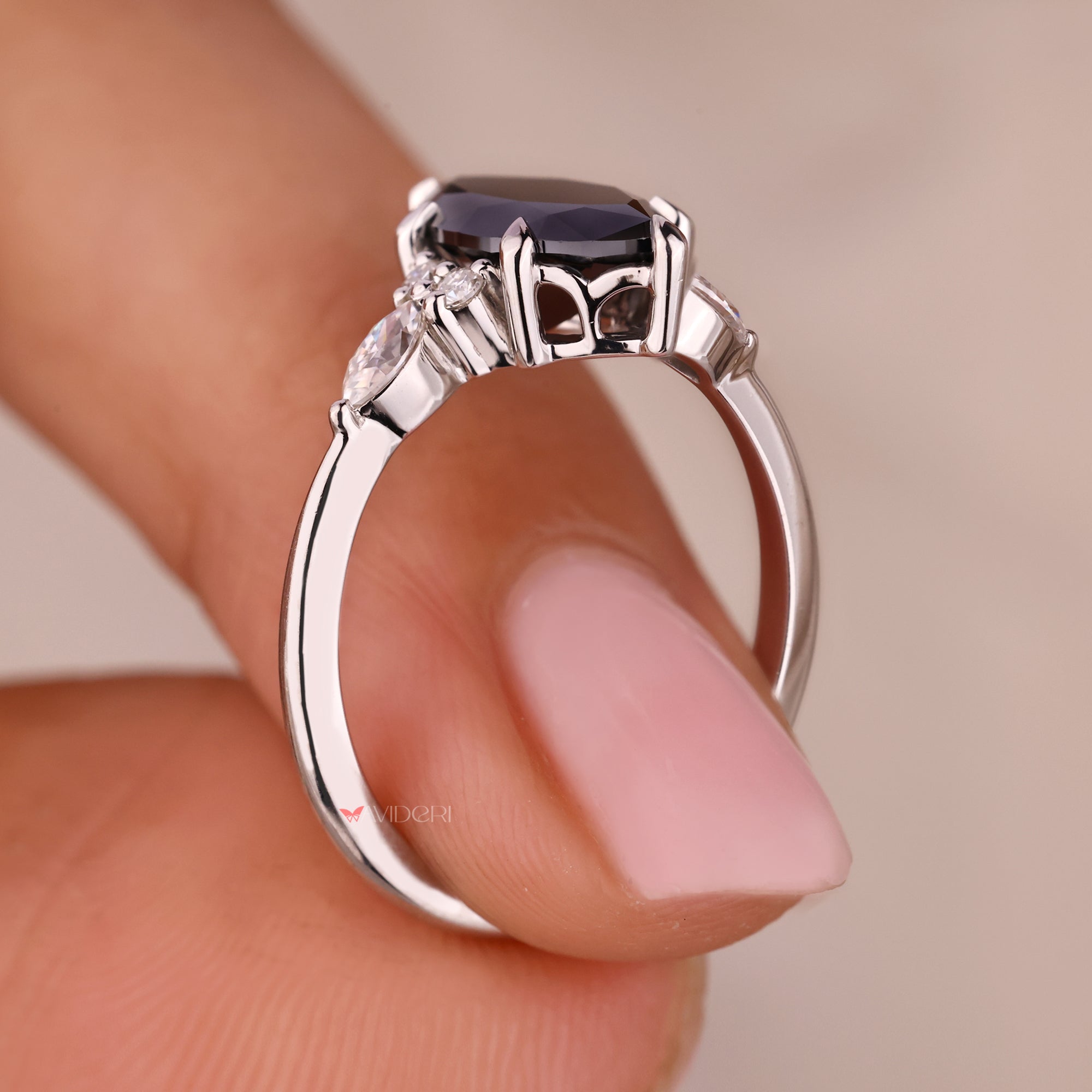 Tapered shank ring with 7 stone engagement ring.