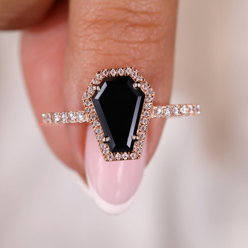 Beautiful Rose gold ring with a shimmering moissanite gem.
