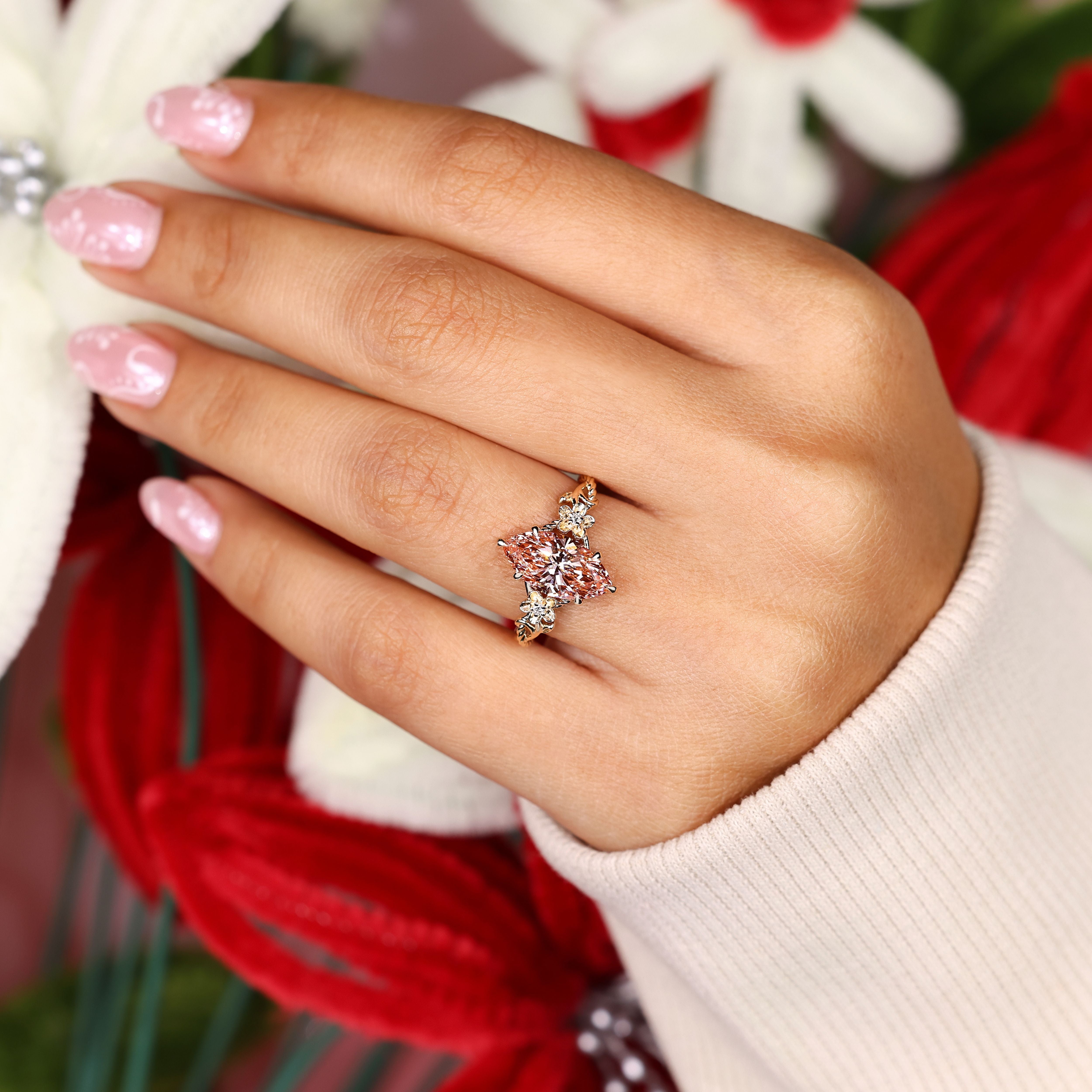 Pink marquise diamond ring with twisted rope shank.
