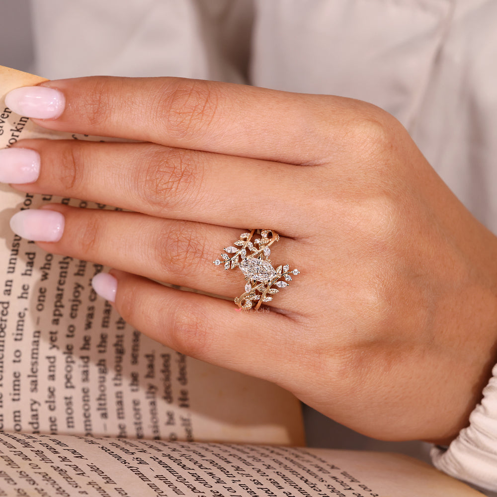 Marquise and round diamond band bridal set design.
