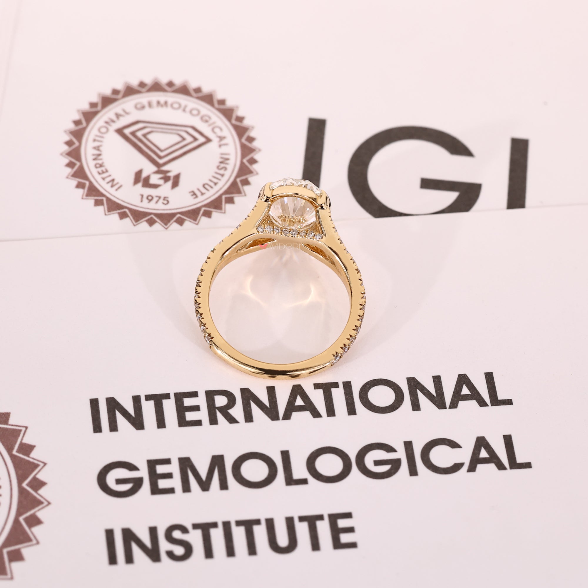 Cathedral setting ring with bridge accent ring.