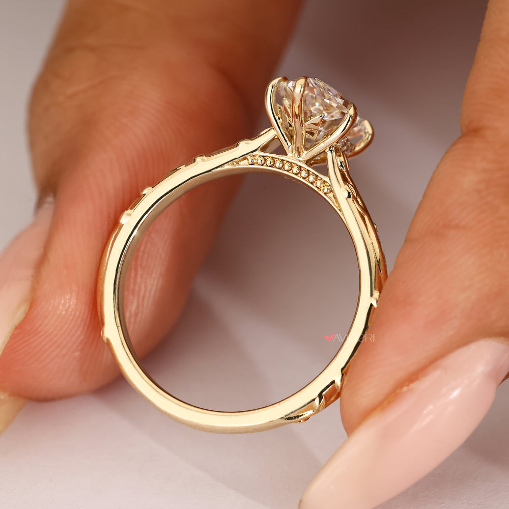 Hidden half halo marquise ring with round diamonds.
