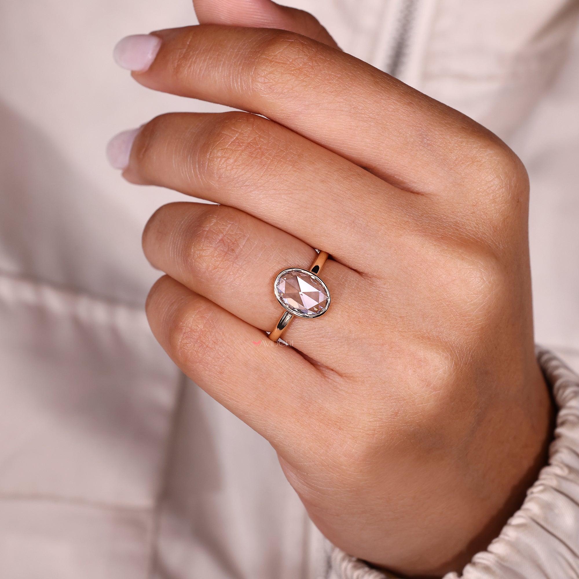 Avideri oval rose cut solitaire diamond ring.
