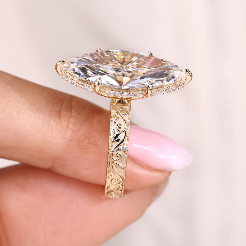 Art deco engagement ring with milgrain details.