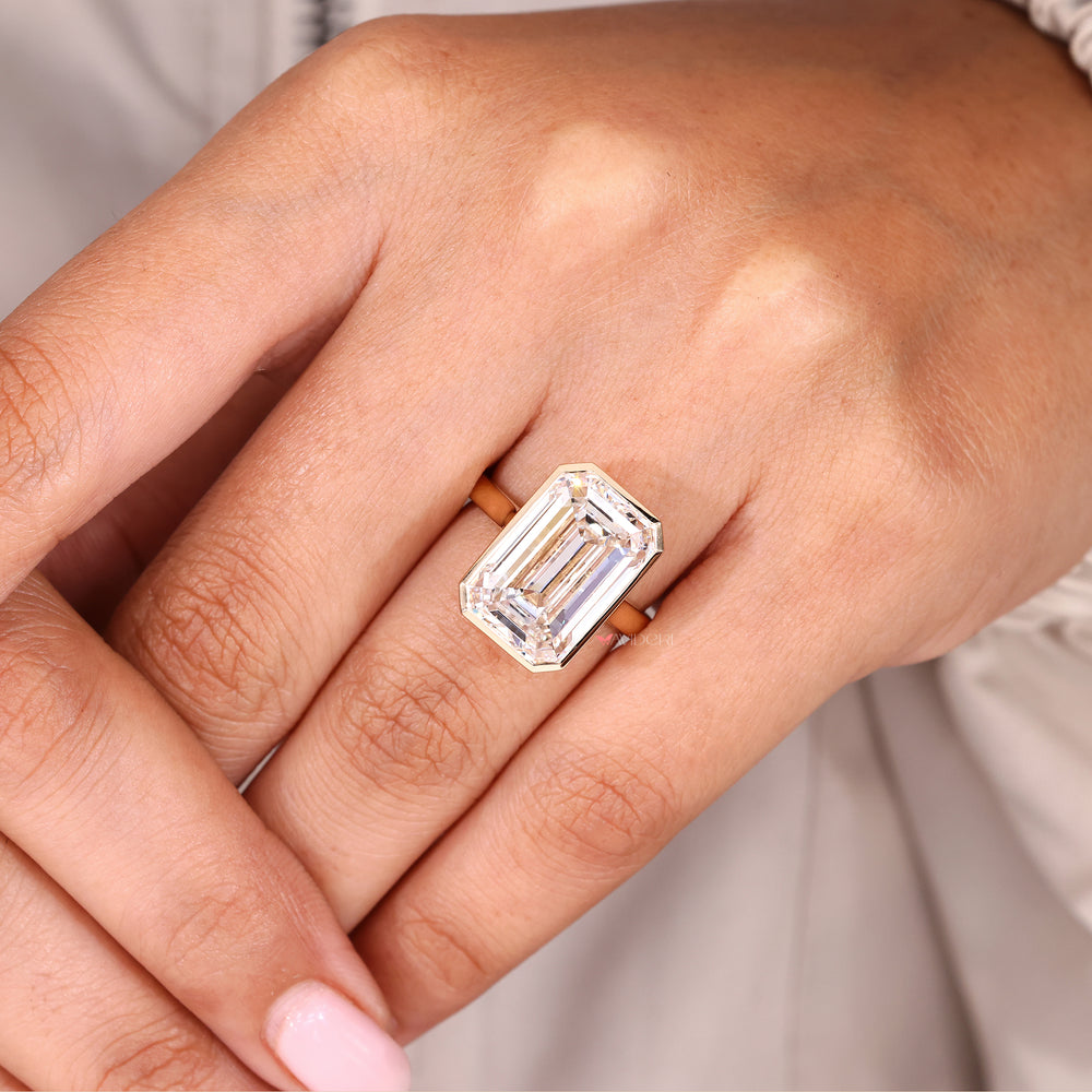 IGI Certified Emerald Cut Diamond Ring in Yellow Gold.