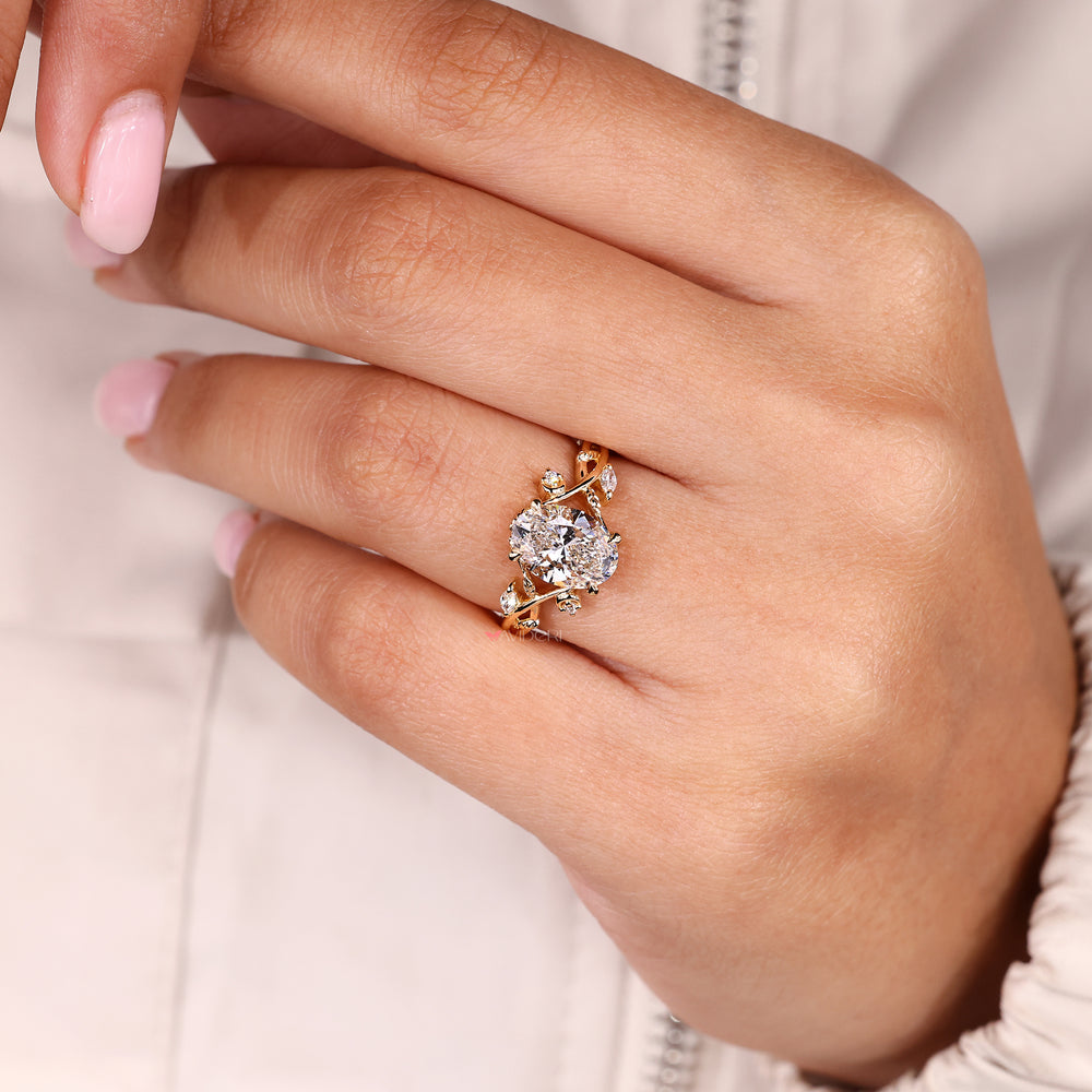 Lab Grown Oval Cut Diamond Ring with Marquise Side Stones.