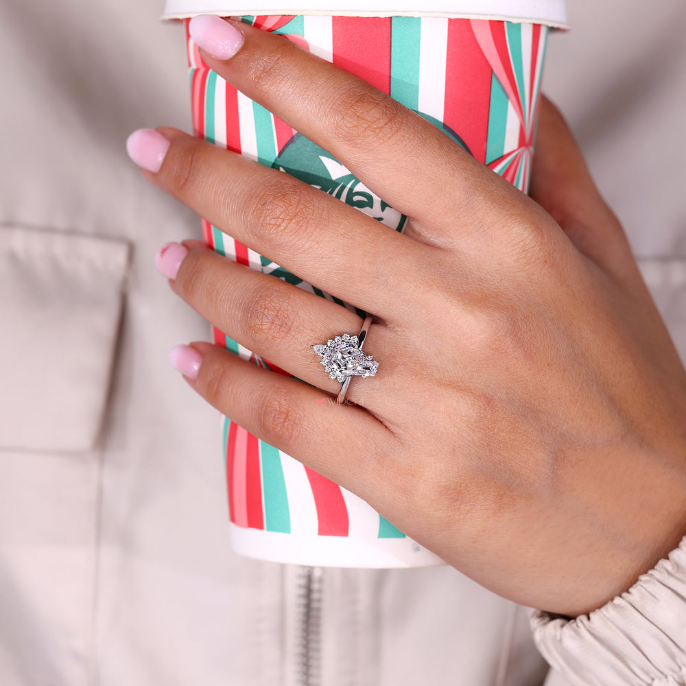 Pear cut diamond ring with soft vintage look.