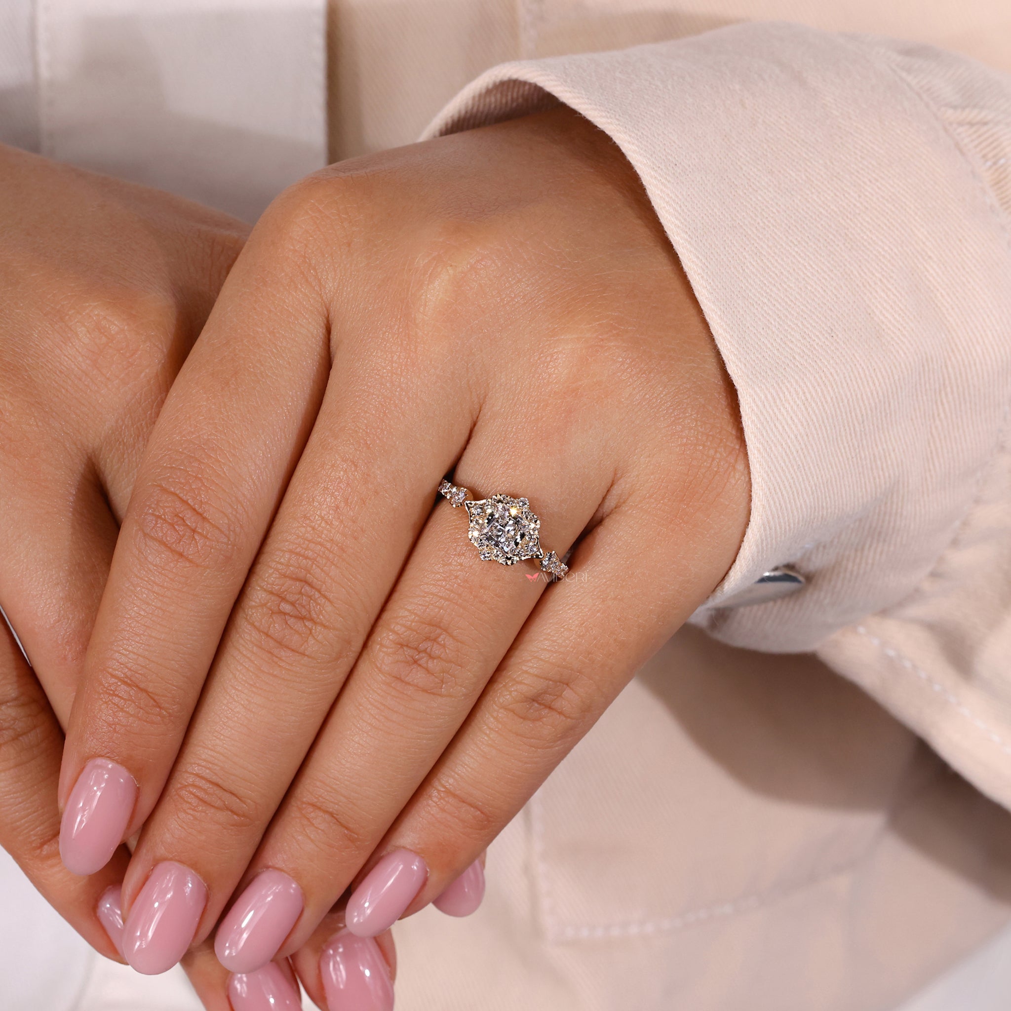 Handmade ring with princess cut diamond design.