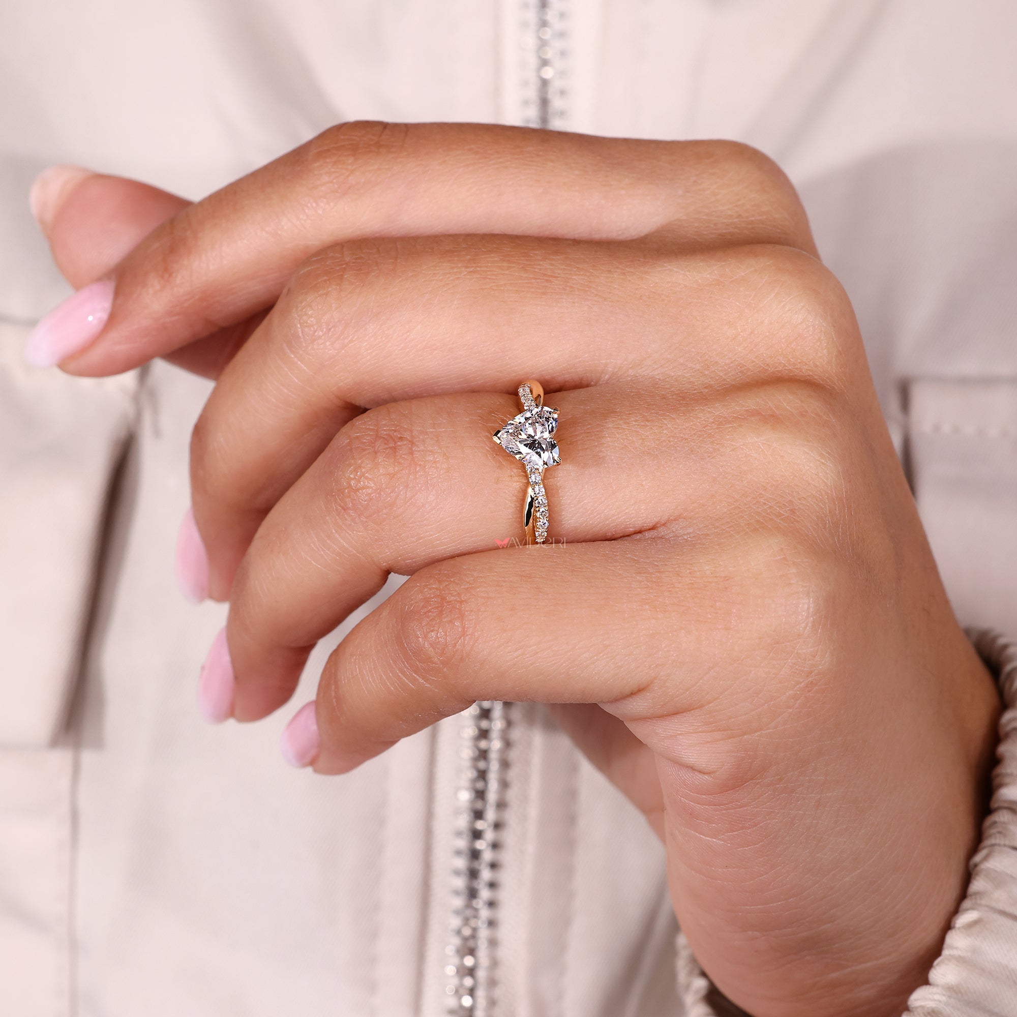 V prong setting heart cut diamond ring.