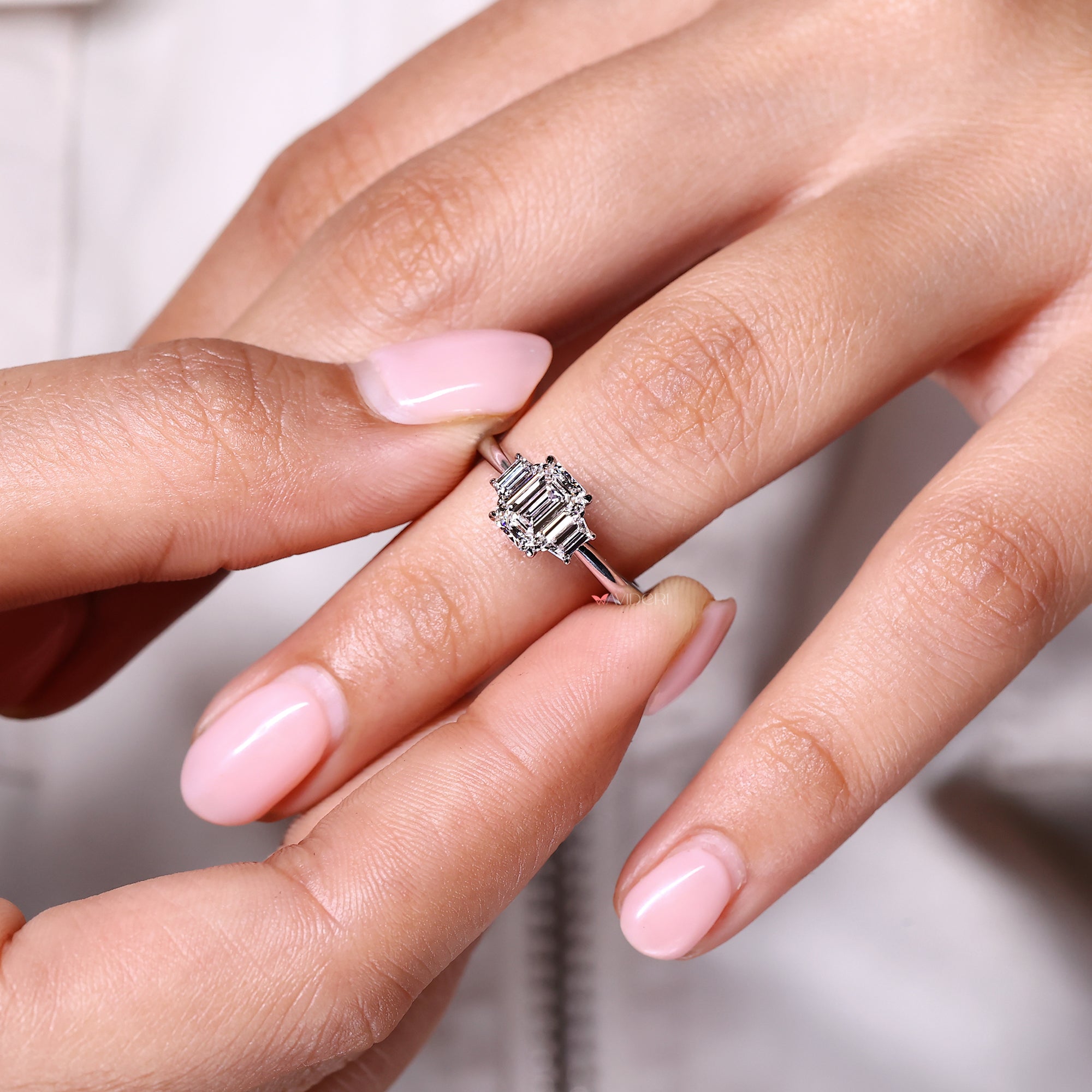 Custom 3 stone ring with 4 prong claw setting and Lab Grown Diamond.