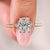 Long cushion cut diamond ring with cathedral setting.
