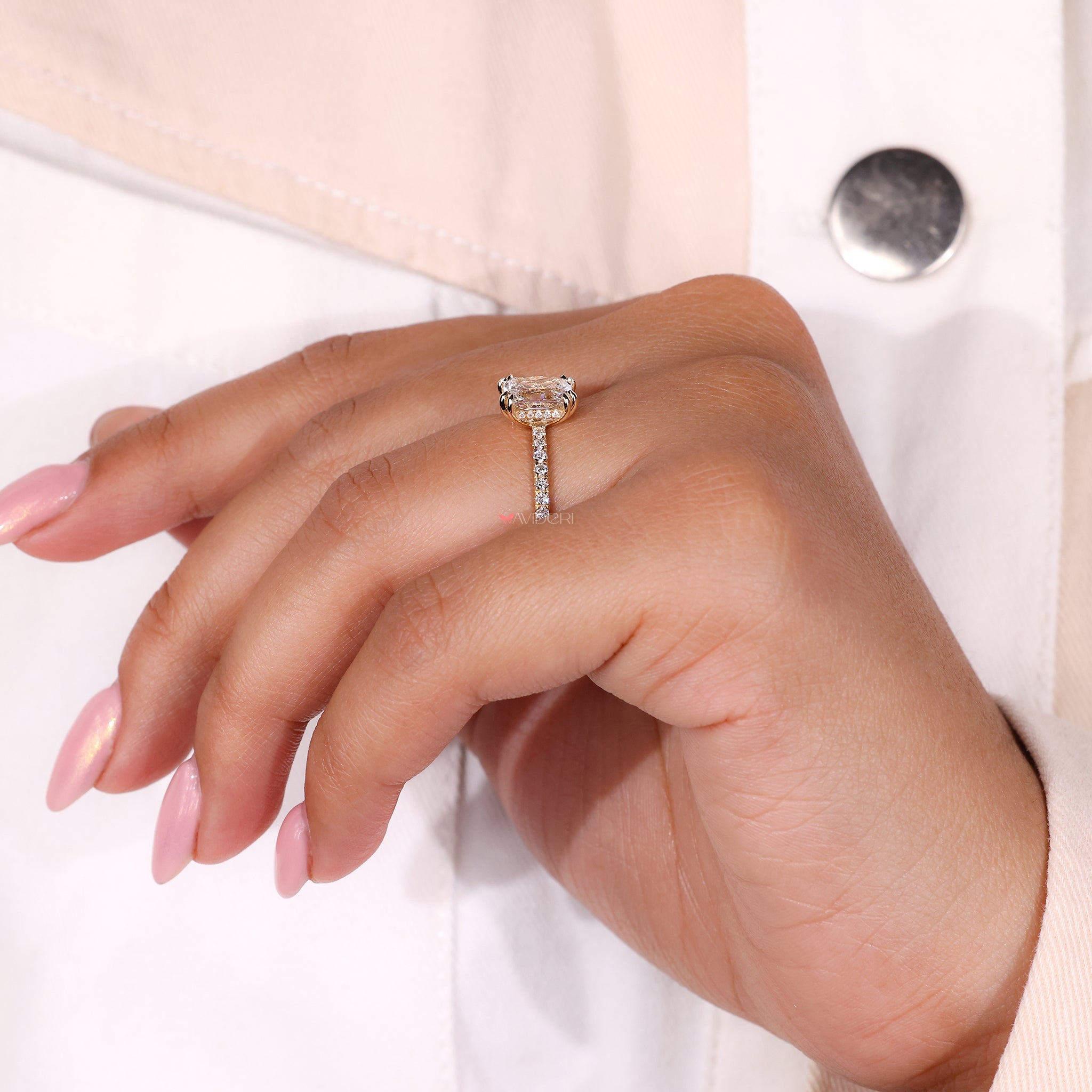 Pave setting ring with double claw prong ring.