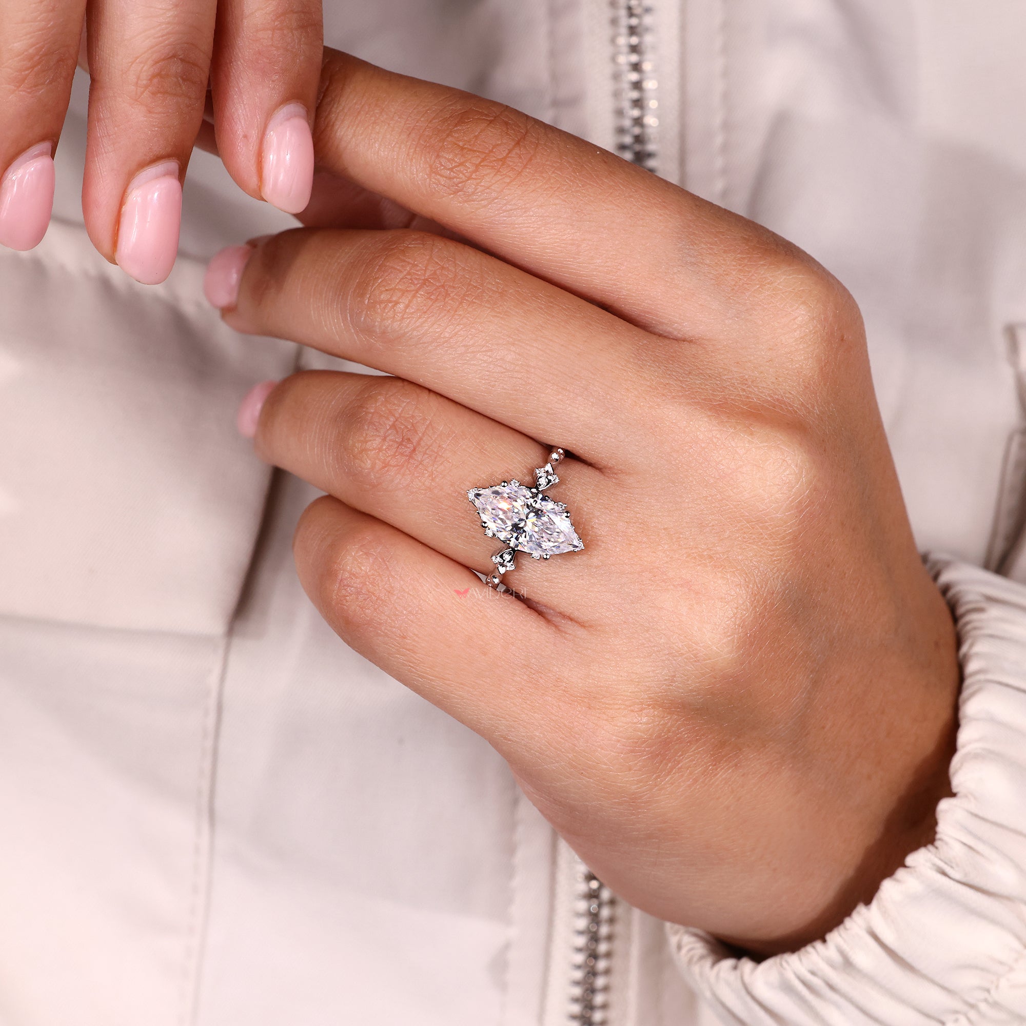 Handmade ring crafted with round stones and clean cluster layout.