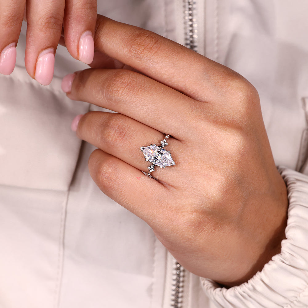 Handmade ring crafted with round stones and clean cluster layout.
