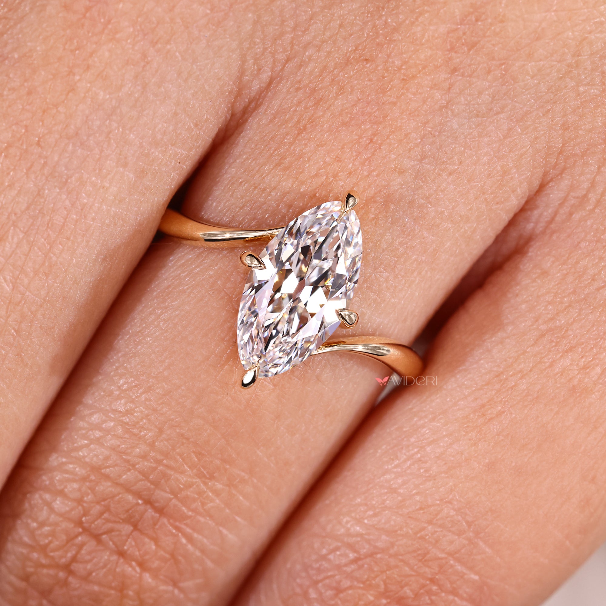 Avideri solitaire diamond ring with marquise cut.