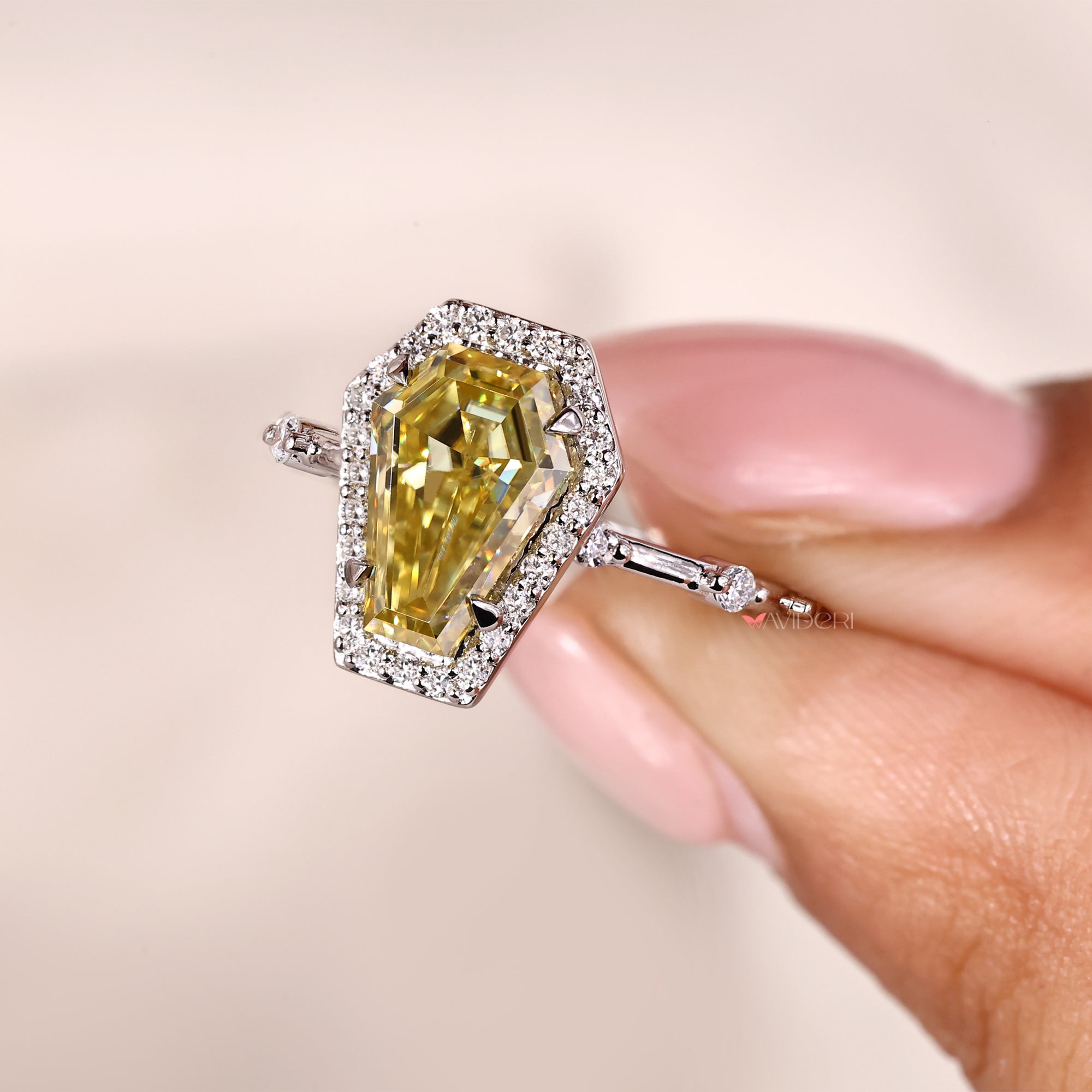 Canary yellow ring with halo engagement ring.