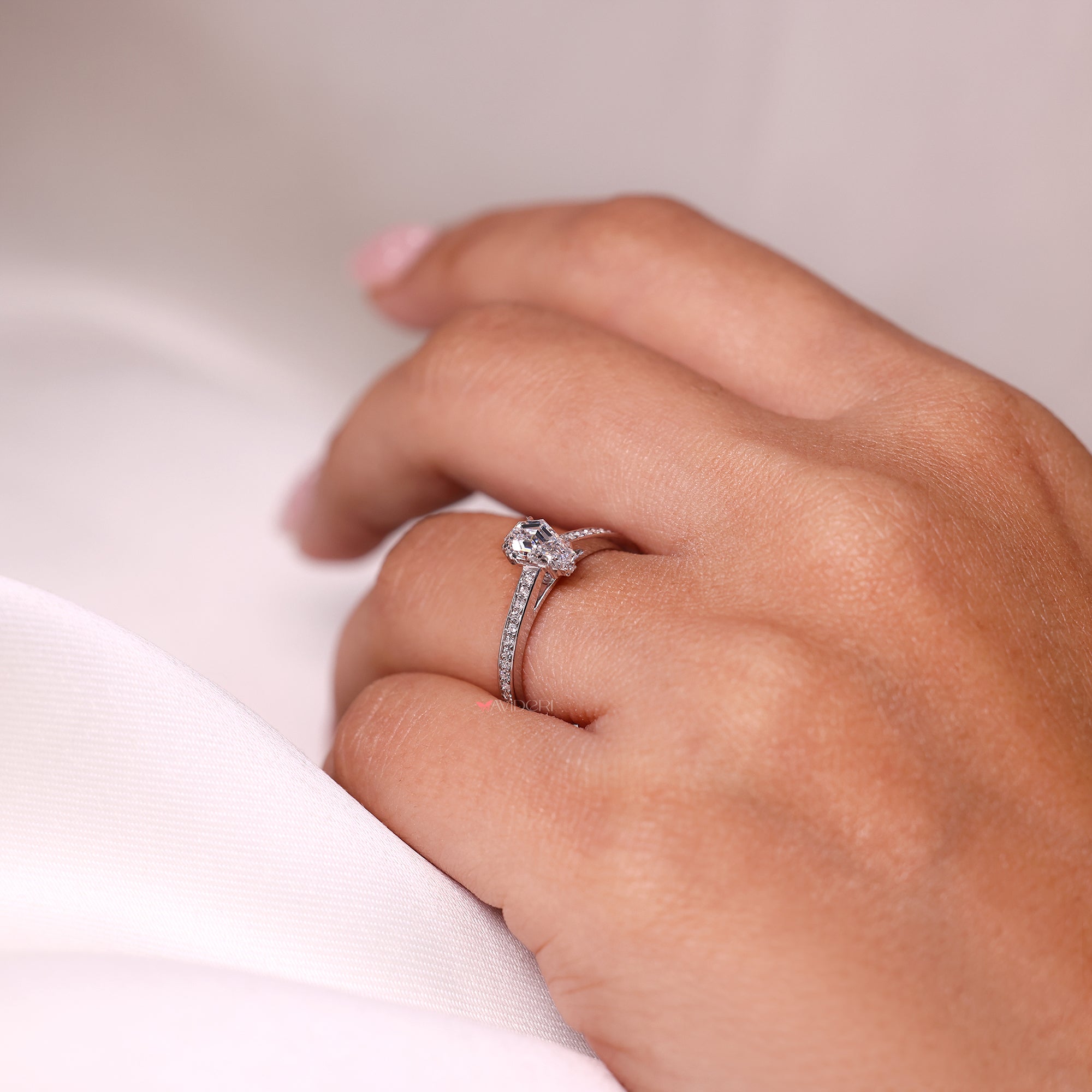 Hidden halo engagement ring with lab-grown ring.