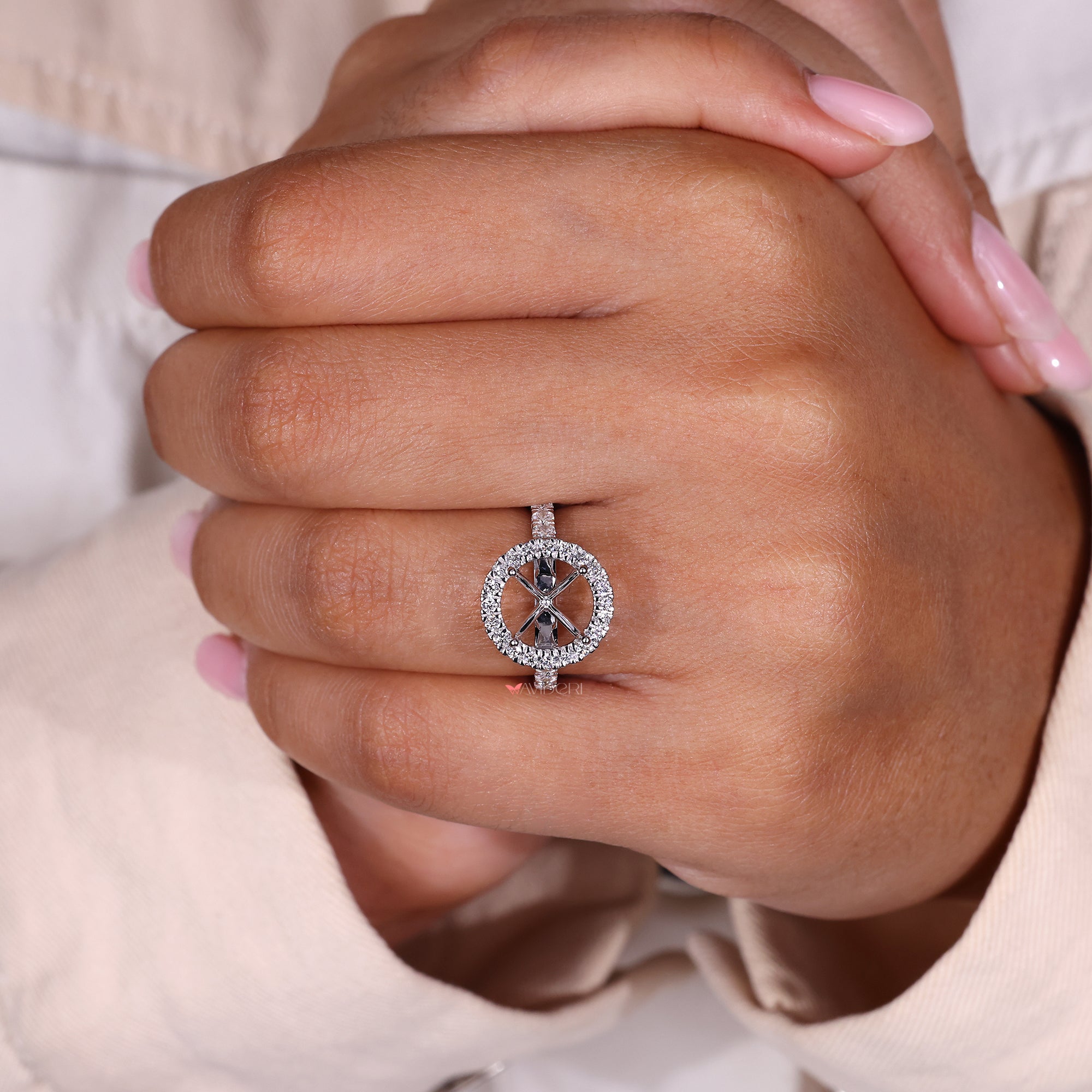 Round diamond pave band with cathedral setting design.
