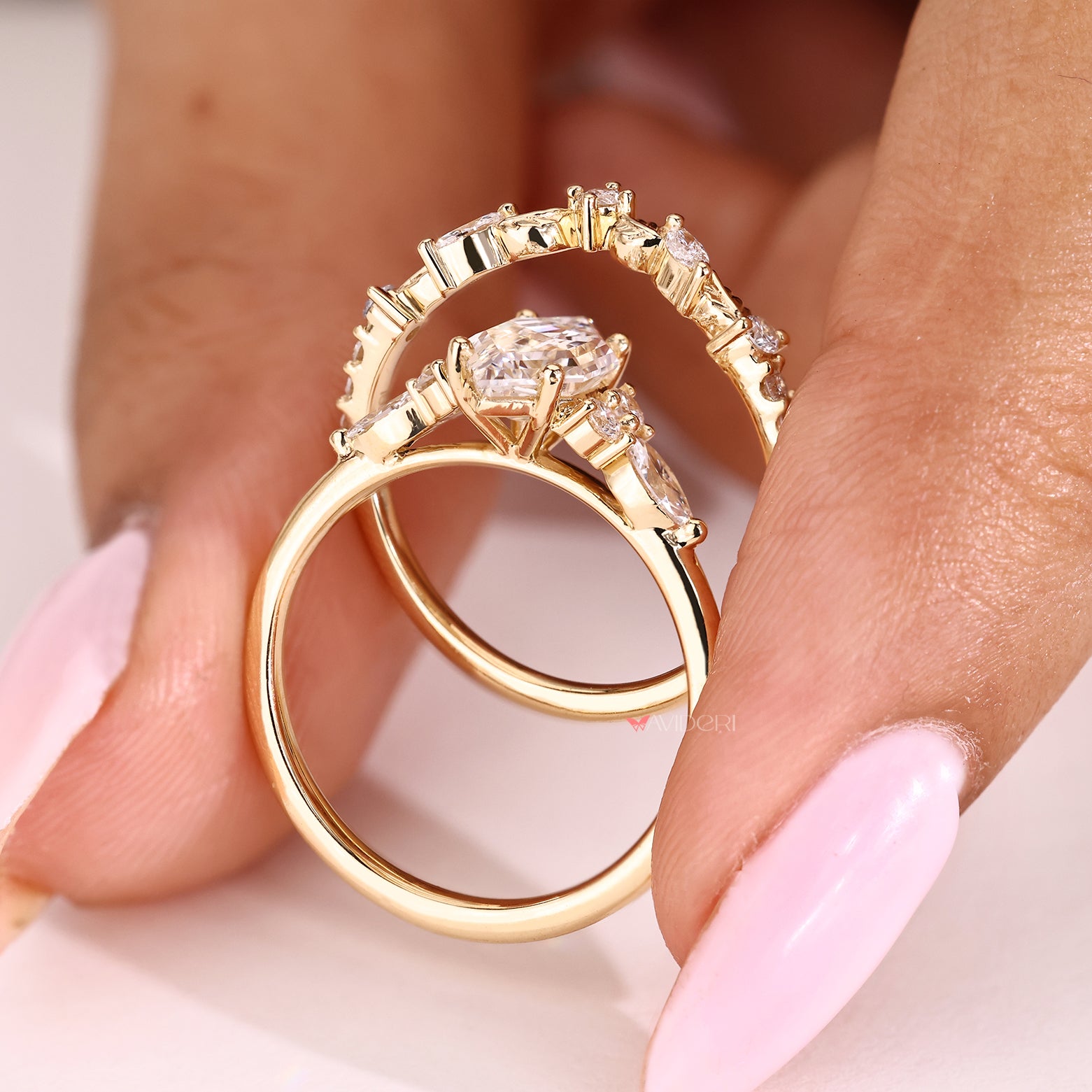 Four prong hexagon diamond ring with semi eternity band
