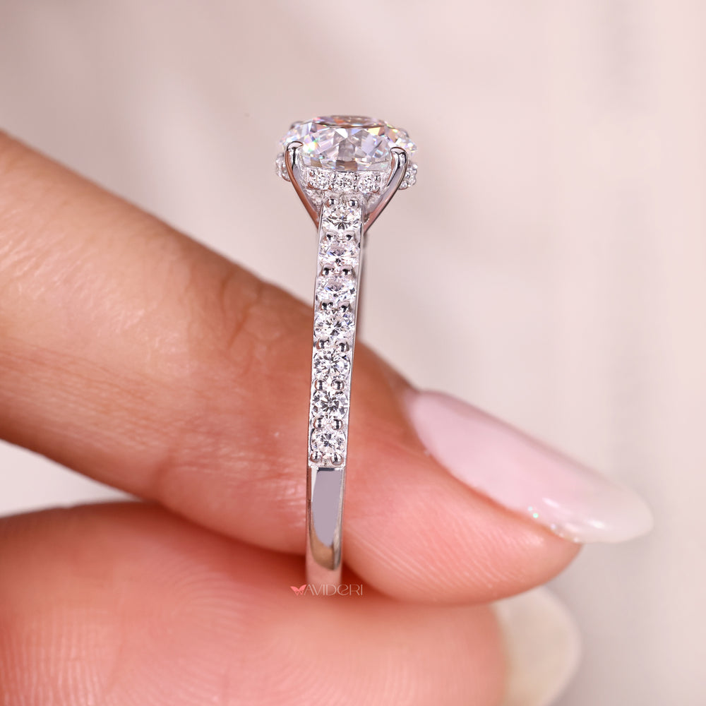 Lab grown round diamond ring with hidden halo style.
