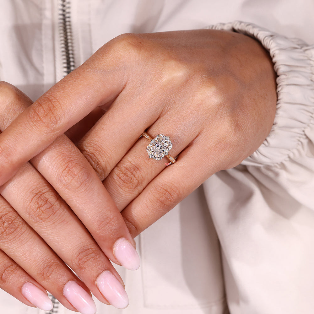 Cathedral setting radiant diamond ring design.
