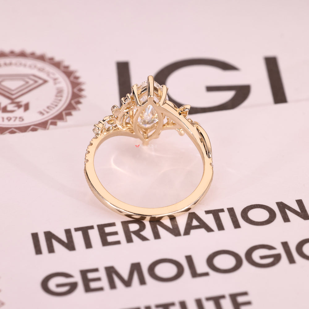 Handmade marquise diamond ring with claw prongs.
