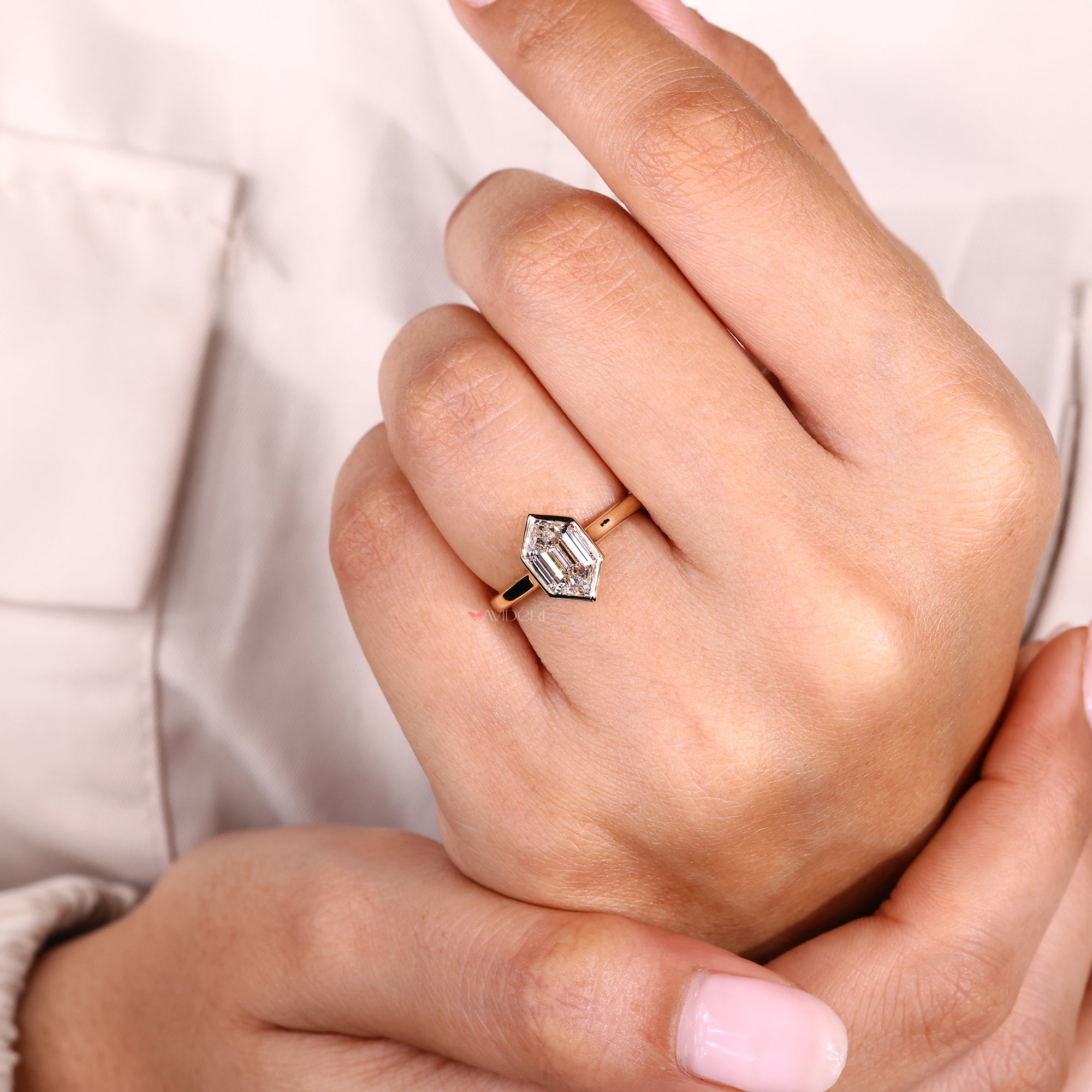Solitaire engagement ring with cathedral setting engagement ring.
