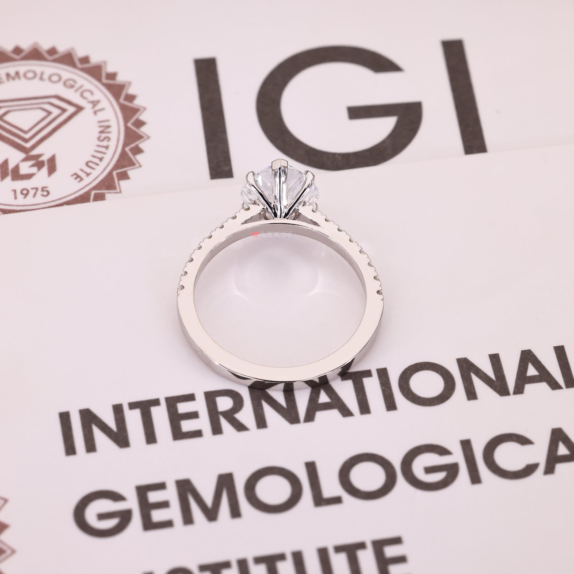 White gold engagement ring with lab-grown diamond ring.