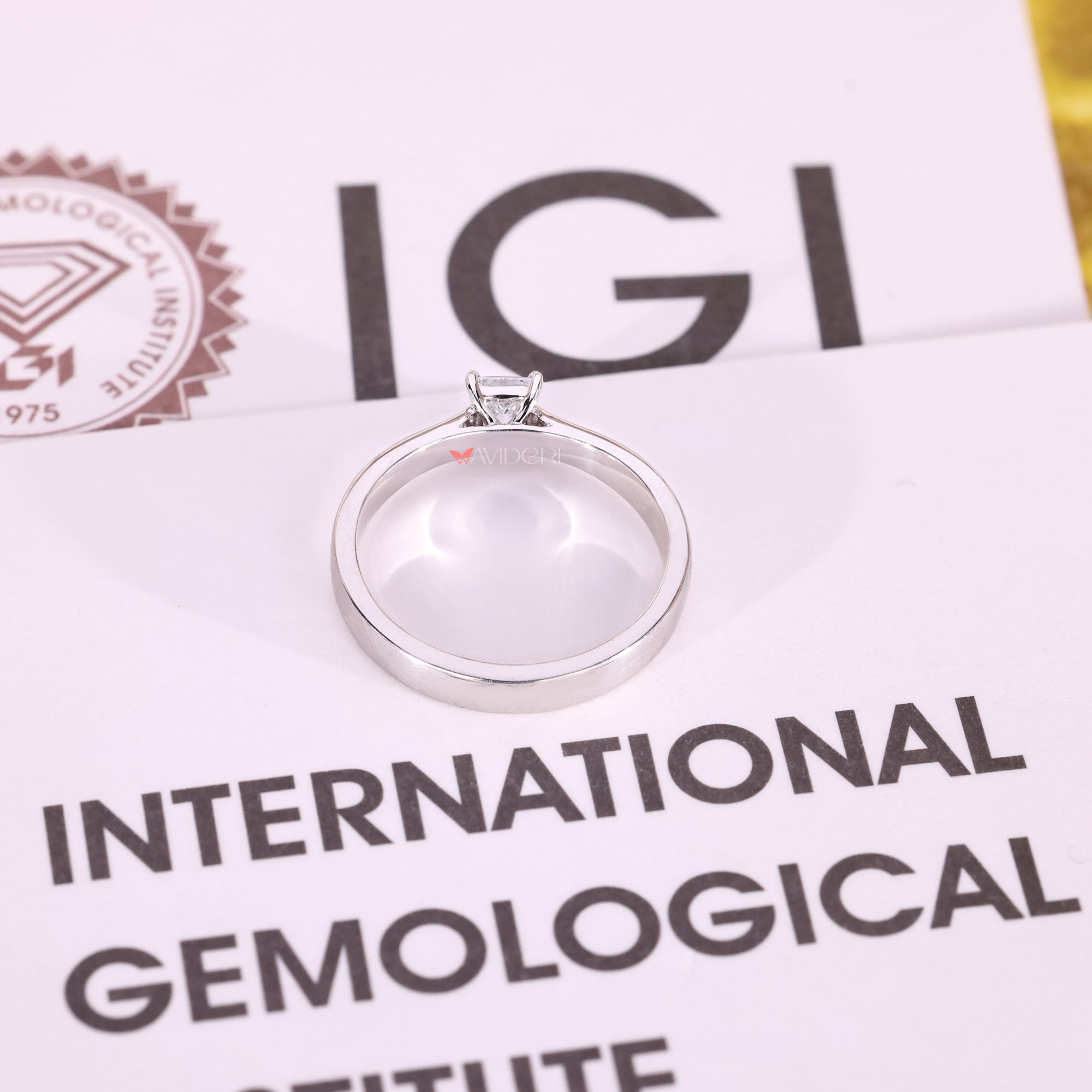 Cathedral setting ring with princess cut solitaire ring.