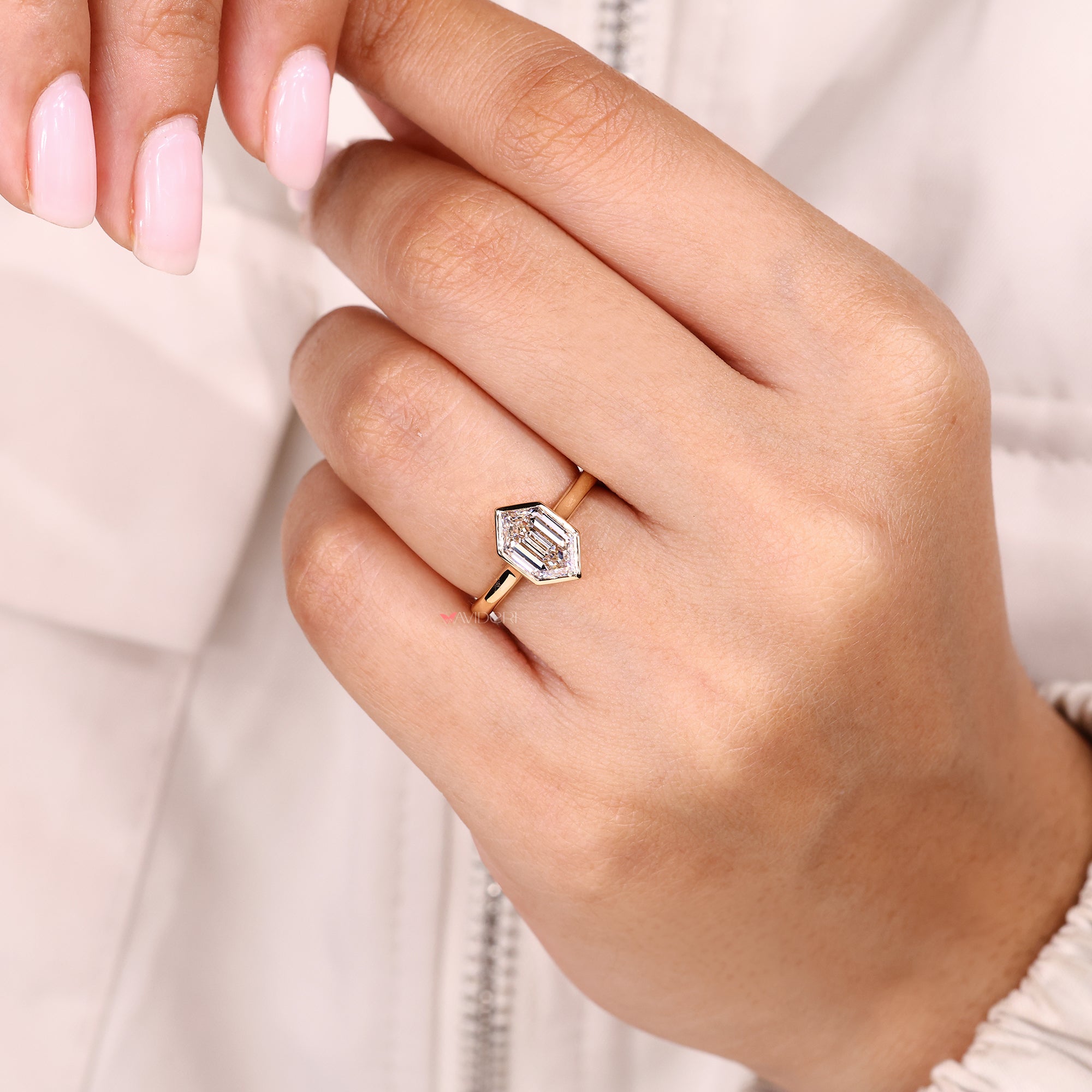 Lab-grown ring with solitaire engagement ring.
